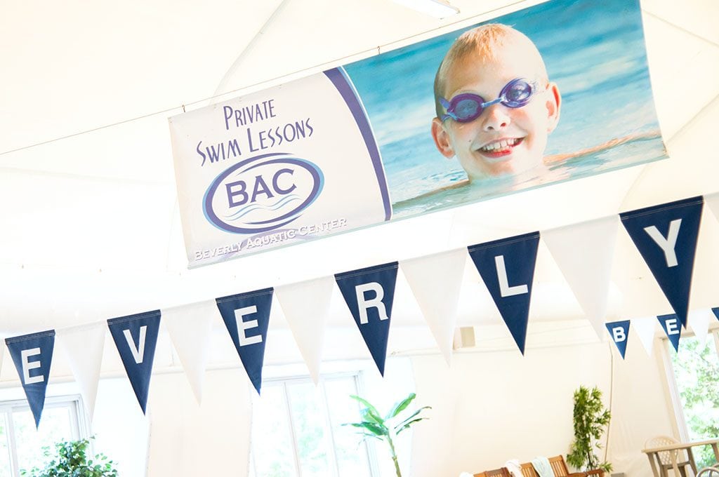BAC swim lesson banner that hangs in the aquatics center