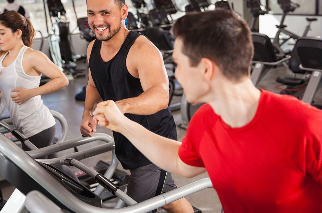 two men on treadmills