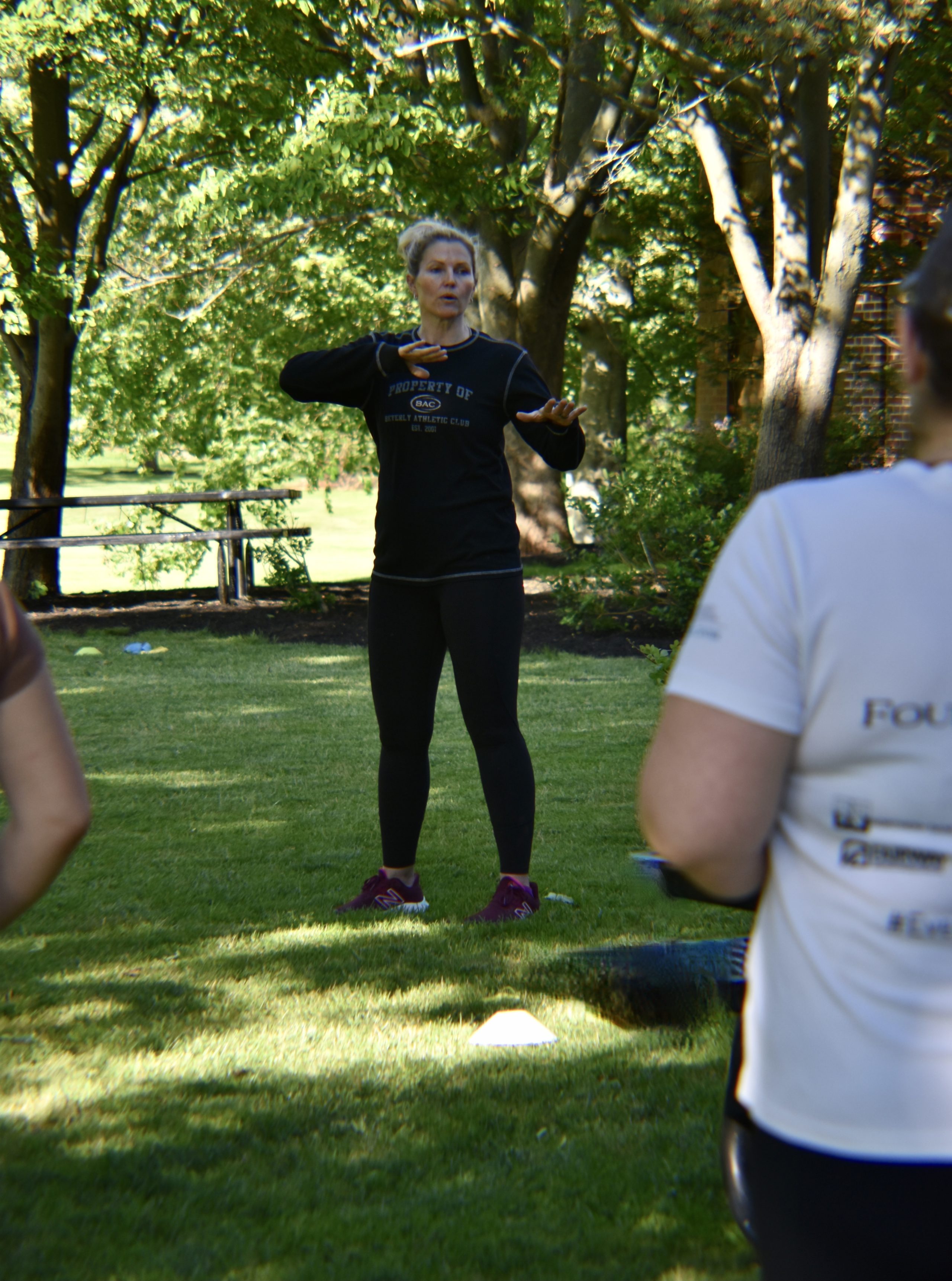 Sarah Lesser Instructing a class at Lynch Park.